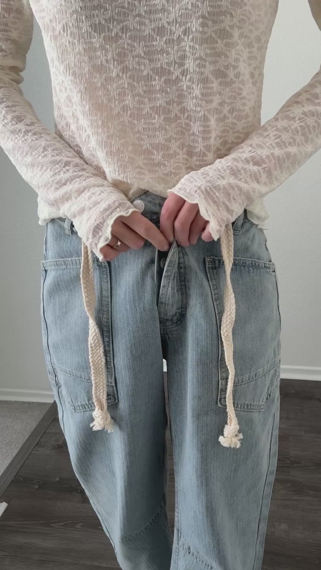 Try-on video of Moxie barrel eyelet jeans in light jacquard stripe showing fit and movement