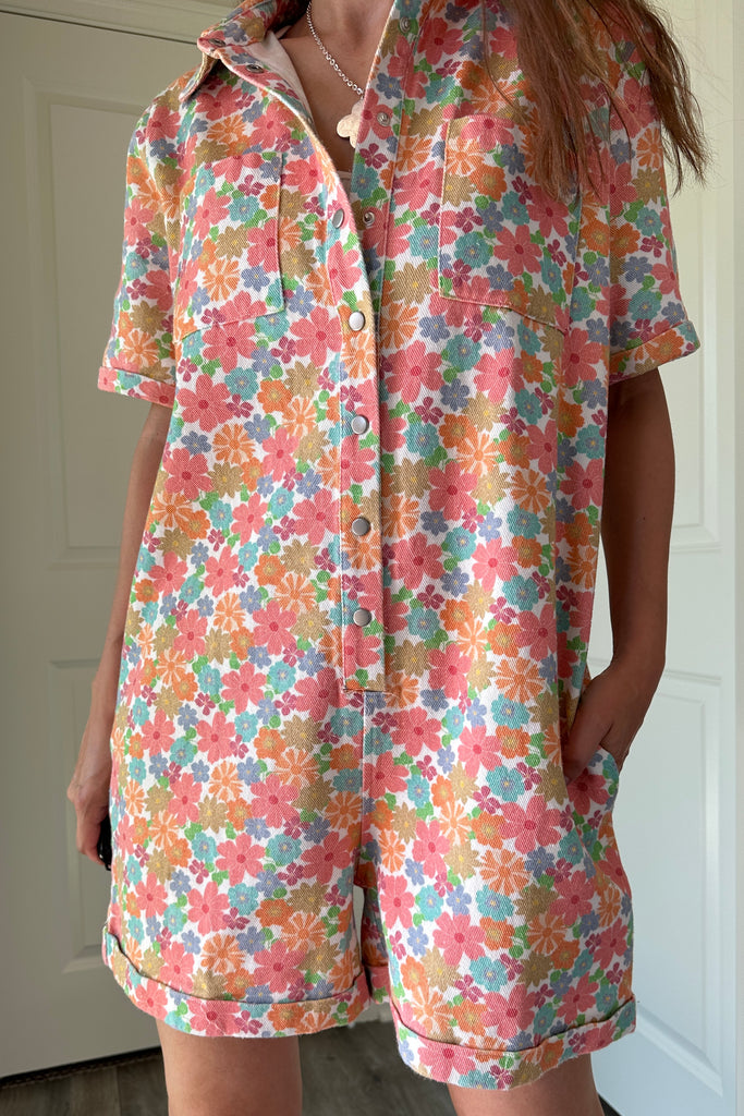 try-on video of Chloe Floral Denim Utility Romper 