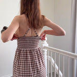Try-on video of Paloma brown gingham maxi dress showing fit, movement, and adjustable straps