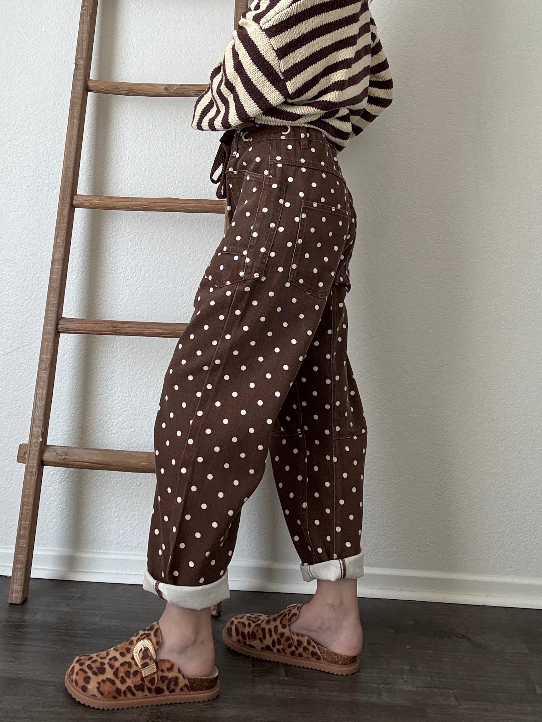 Model try-on video of Moxie Polka Dot Barrel Jeans in Brown showing the relaxed fit, curved leg, and cropped hem
