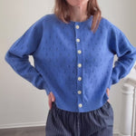 Model wearing Dara Eyelet Button Down Cardigan in Vintage Blue try-on video