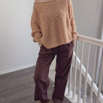 Try-on video of SoftSpun textured boatneck sweater in beige showing relaxed fit and off-shoulder styling
