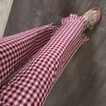 Close-up video of Gingham Ruffle Hem Cotton Pants in Burgundy showing gingham fabric and ruffle hem details