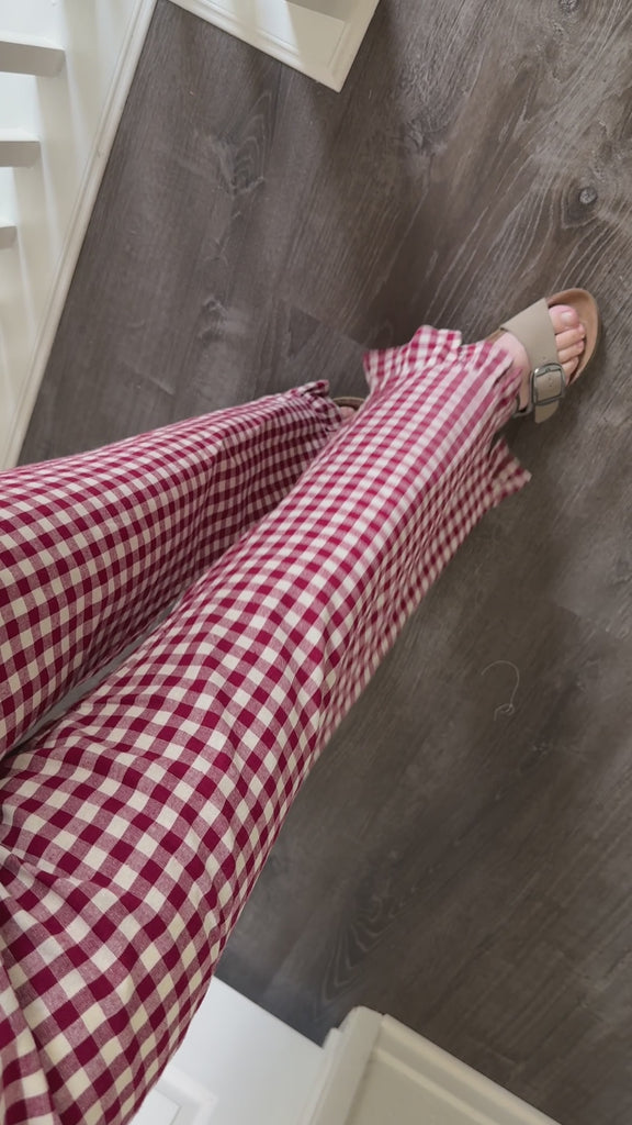 Close-up video of Gingham Ruffle Hem Cotton Pants in Burgundy showing gingham fabric and ruffle hem details