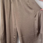 video of olive satin fabric and delicate lace-trimmed hems on Daydream barrel pants