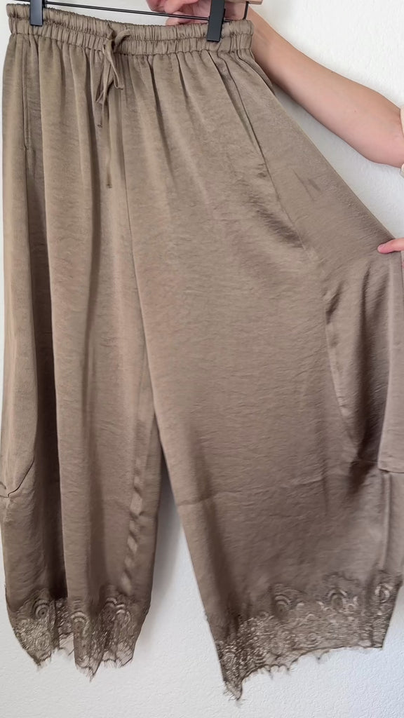 video of olive satin fabric and delicate lace-trimmed hems on Daydream barrel pants