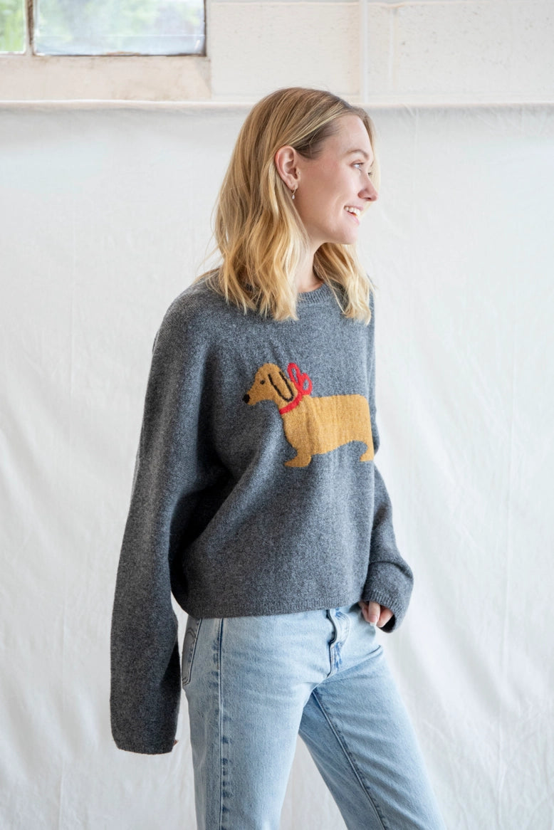 Angled front view of Puppy Love crew sweater in charcoal