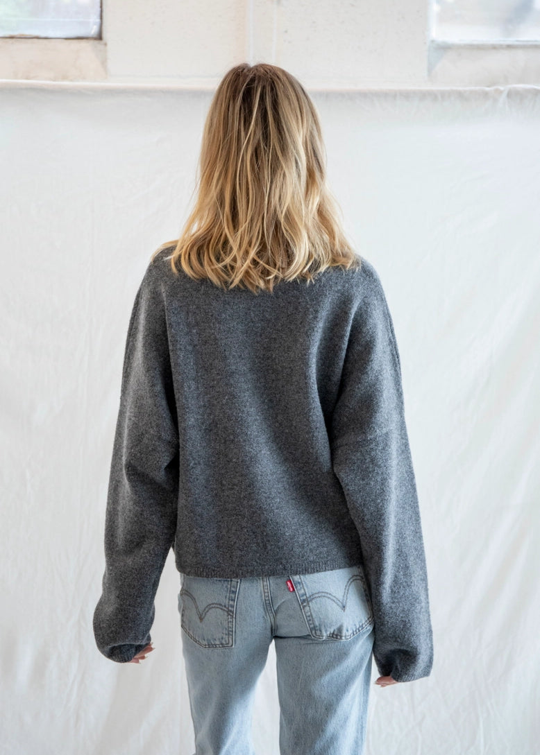 Back view of Puppy Love crew sweater showing relaxed oversized fit