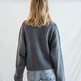 Back view of Puppy Love crew sweater showing relaxed oversized fit