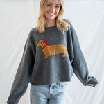 Model is wearing Puppy Love crew sweater in charcoal with relaxed oversized fit