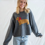 Model is wearing Puppy Love crew sweater in charcoal with relaxed oversized fit