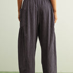Back view of Quinn Loose Cotton Pinstripe Pants in blue and stone