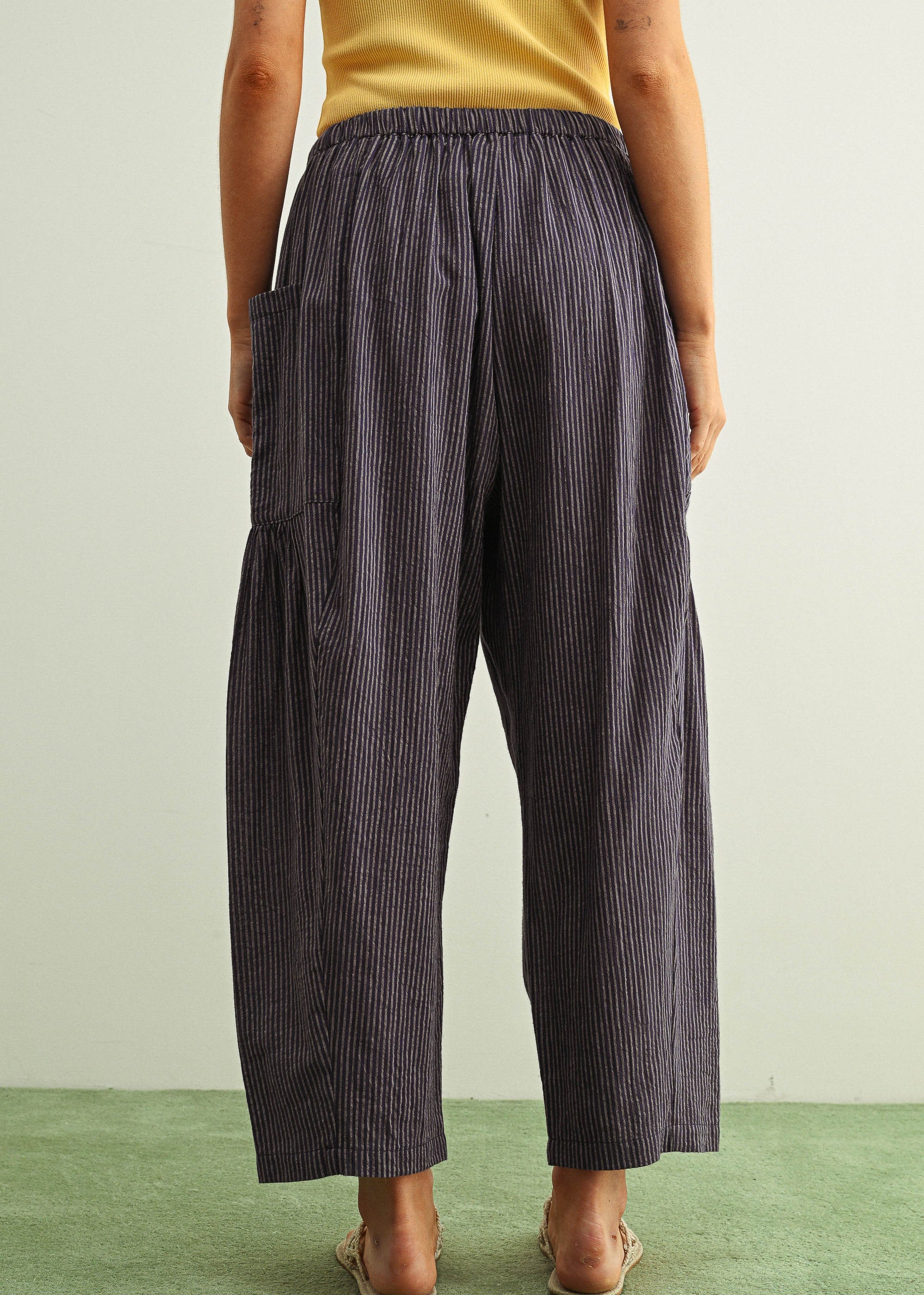 Back view of Quinn Loose Cotton Pinstripe Pants in blue and stone