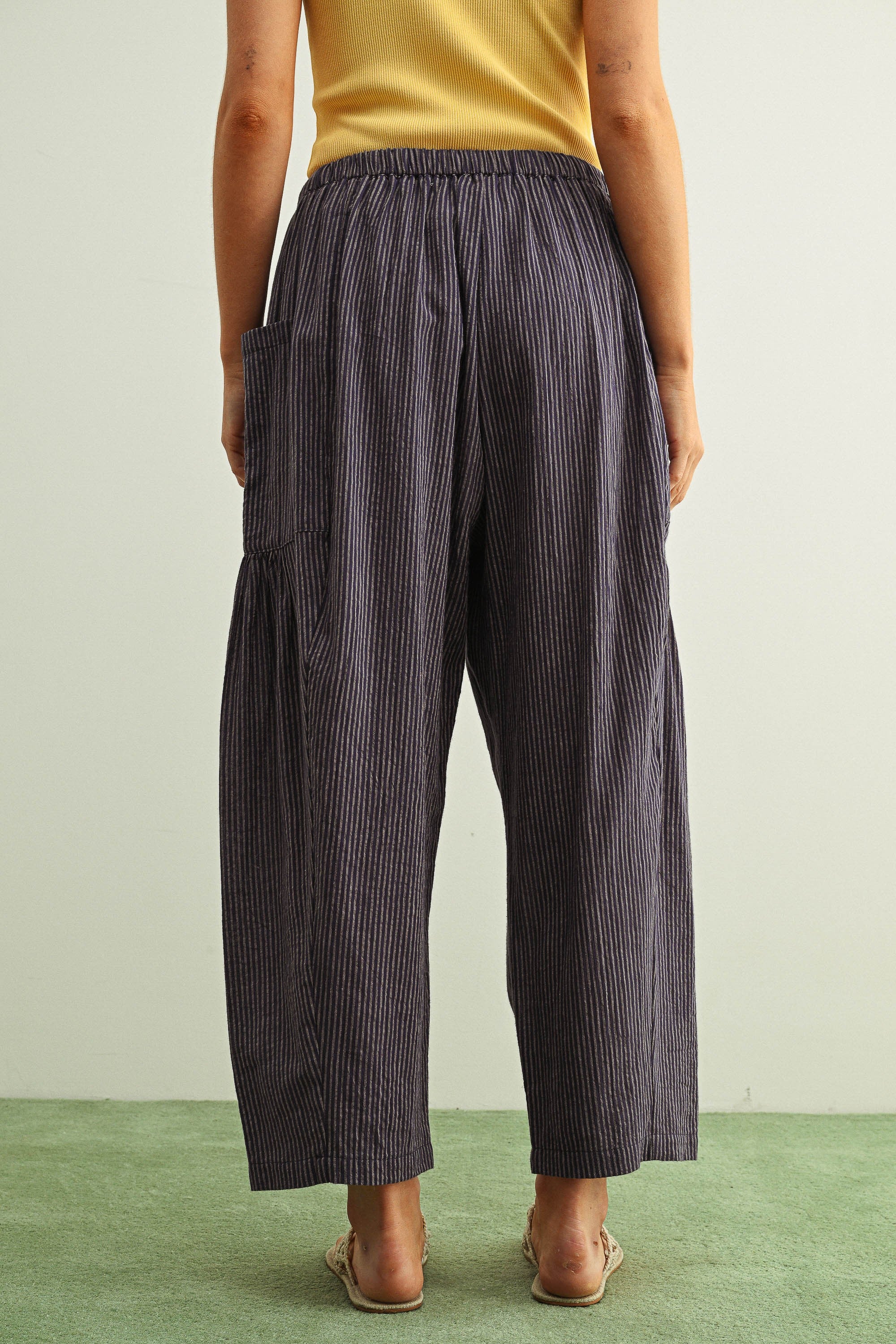 Back view of Quinn Loose Cotton Pinstripe Pants in blue and stone