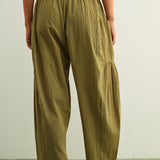 Back view of Quinn Loose Cotton Pinstripe Pants in green and stone