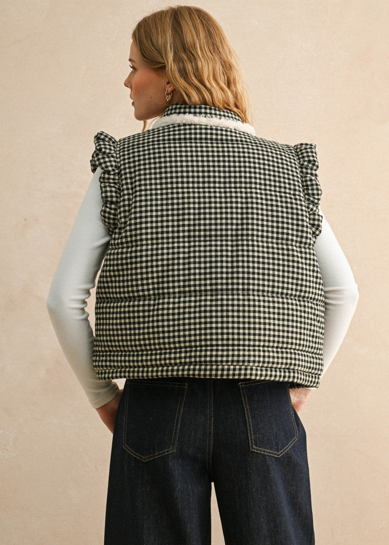 Back view of the black gingham puffer vest showing the quilted silhouette and relaxed fit