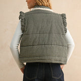 Back view of the black gingham puffer vest showing the quilted silhouette and relaxed fit