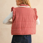Back view of the red gingham puffer vest showing quilted texture and relaxed fit