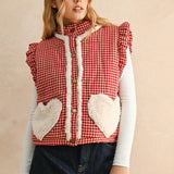 Front view of the Rosie Gingham Sherpa Puffer Vest in red showing stand collar and sherpa heart pockets