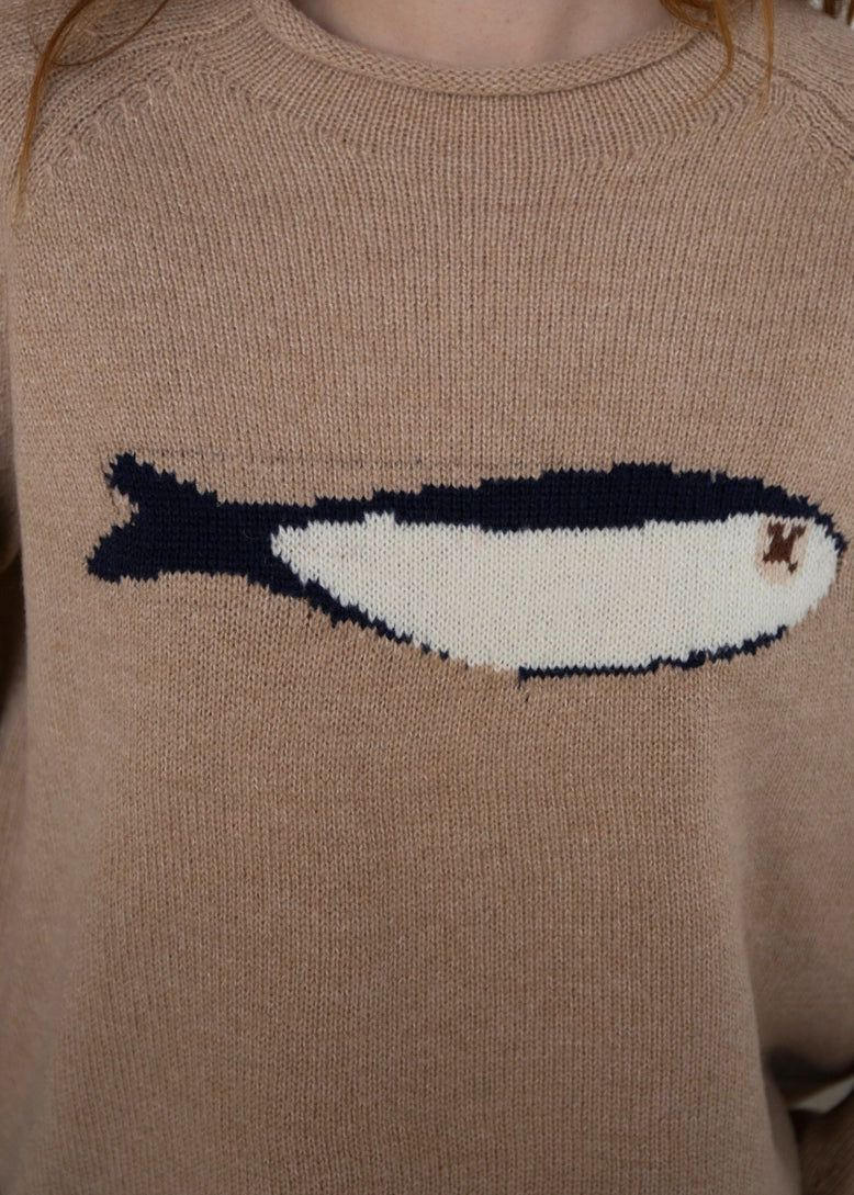 Close-up of the sardine graphic detail on the oat balloon sleeve sweater