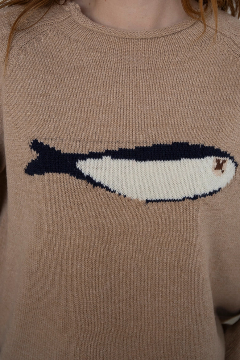 Close-up of the sardine graphic detail on the oat balloon sleeve sweater