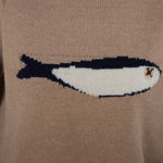Close-up of the sardine graphic detail on the oat balloon sleeve sweater