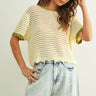 Scalloped mesh knit short sleeve top in cream with sage trim styled with casual outfit