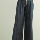 Scout Lightweight Pull-On Wide Leg Jeans in denim, front view with elastic waistband, drawstring tie, and wide leg fit