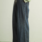 Scout Lightweight Pull-On Wide Leg Jeans in denim, side view showing soft lightweight fabric, front pleats, and relaxed wide leg silhouette