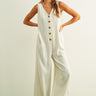 Sienna striped button-front jumpsuit in cream and black with wide-leg silhouette and side pockets