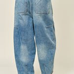 Silverton medium wash barrel jeans, back view with relaxed fit and seam detailing