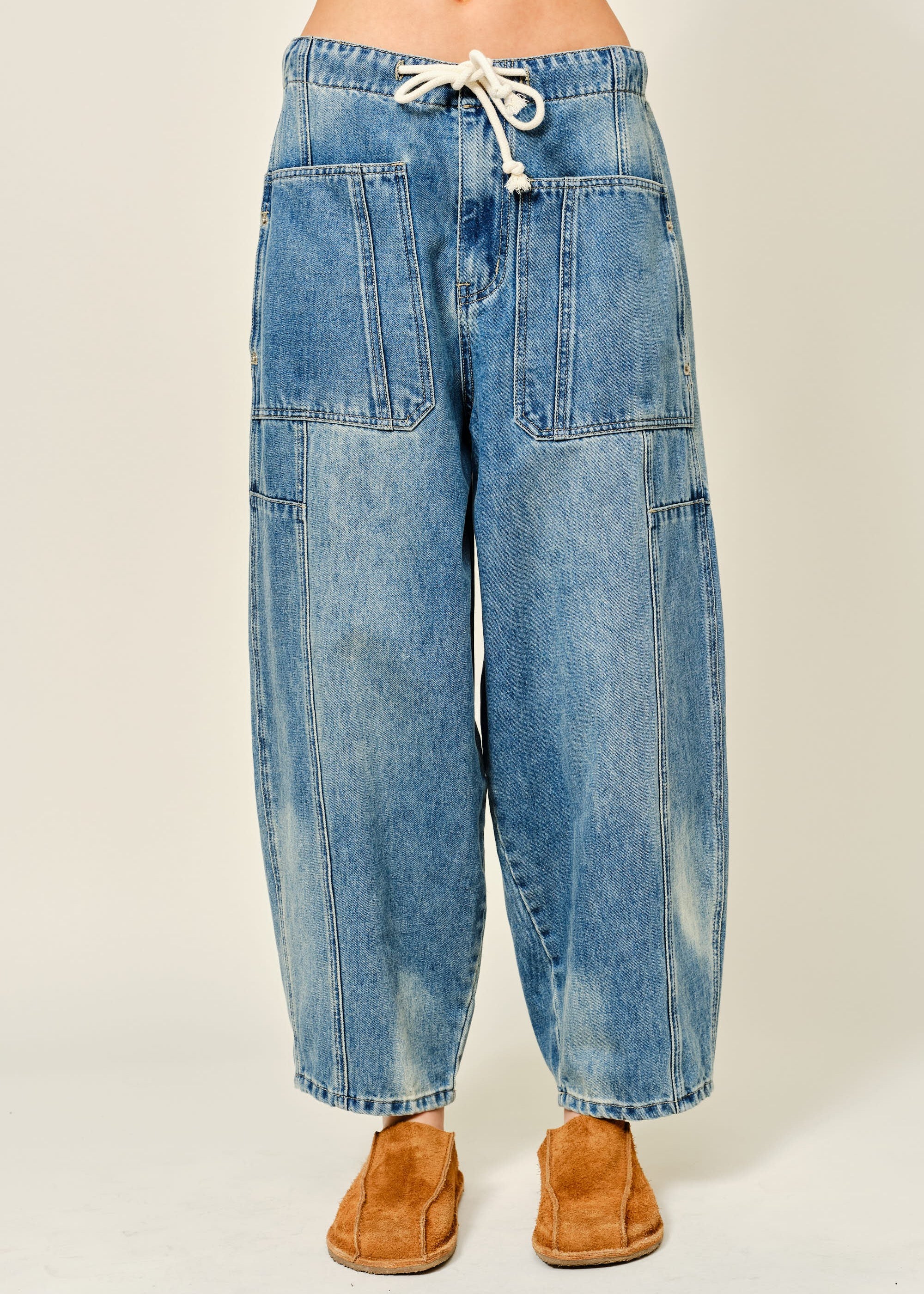 Silverton drawstring barrel jeans in medium wash, front view with oversized patch pockets