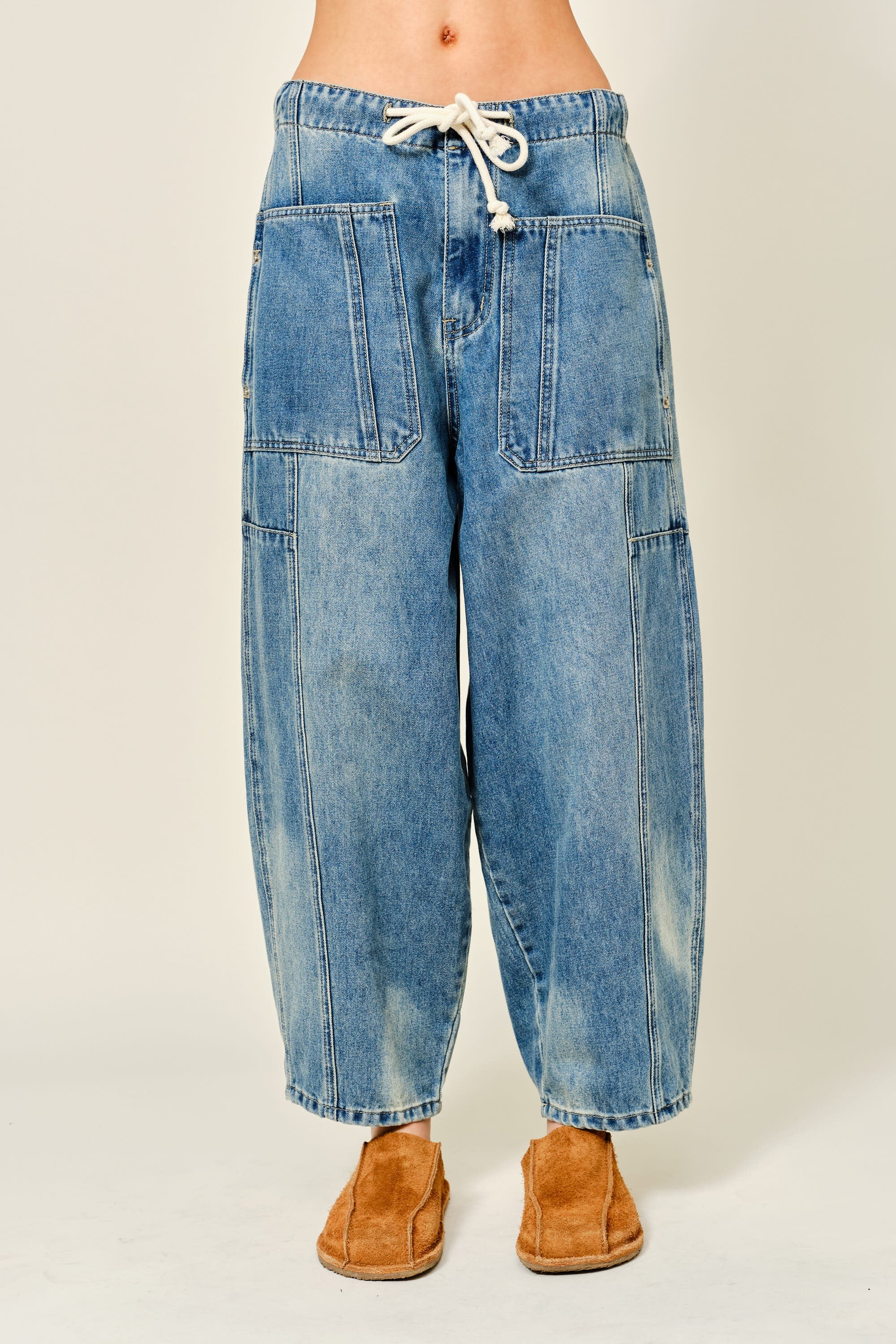 Silverton drawstring barrel jeans in medium wash, front view with oversized patch pockets