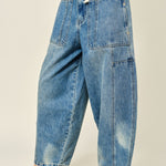 Silverton drawstring barrel jeans in medium wash, side view showing balloon leg shape