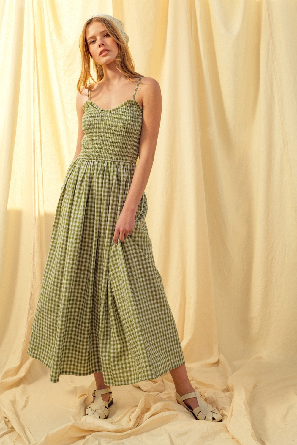 Smocked cotton gingham maxi dress in green with spaghetti straps and flowing skirt