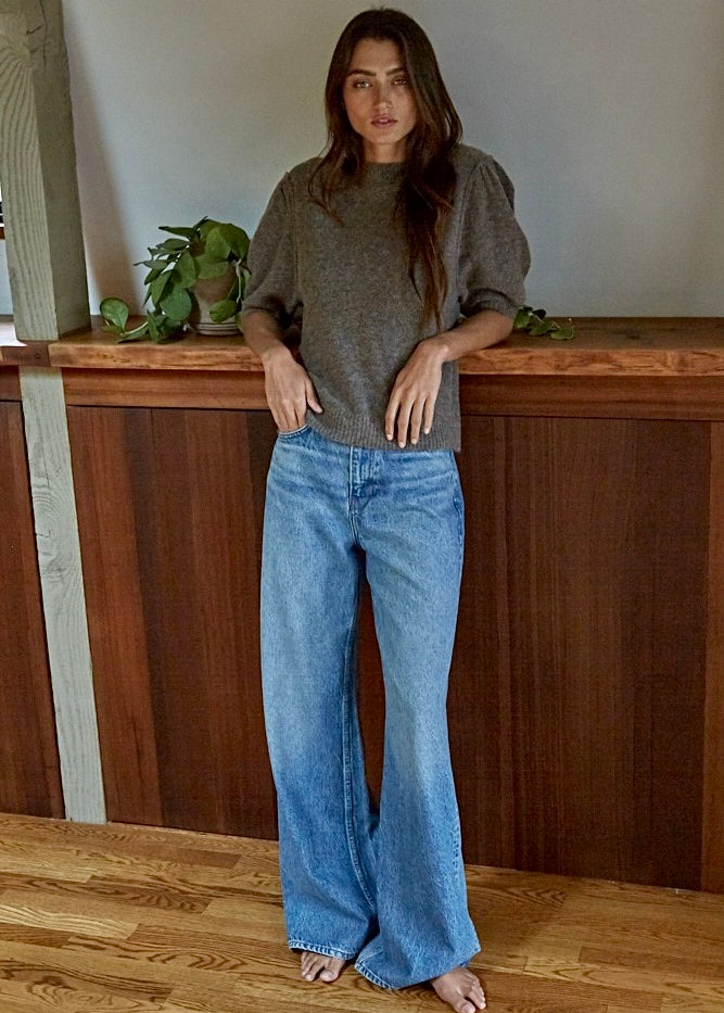 Full body view of soft balloon sleeve short sleeve sweater styled casually in dark mocha