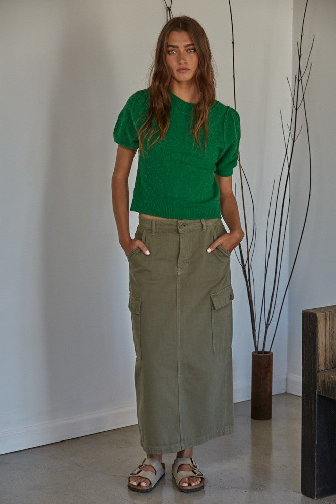 Full body view of soft balloon sleeve short sleeve sweater styled casually in kelly green