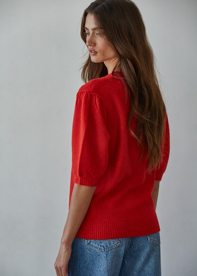 Back view of the Soft Balloon Sleeve Short Sleeve Sweater in red, relaxed fit