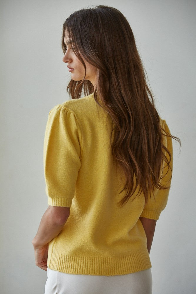 Back view of the Soft Balloon Sleeve Short Sleeve Sweater in yellow, relaxed fit