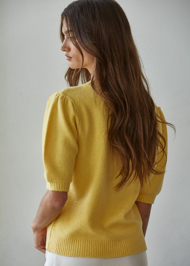 Back view of the Soft Balloon Sleeve Short Sleeve Sweater in yellow, relaxed fit