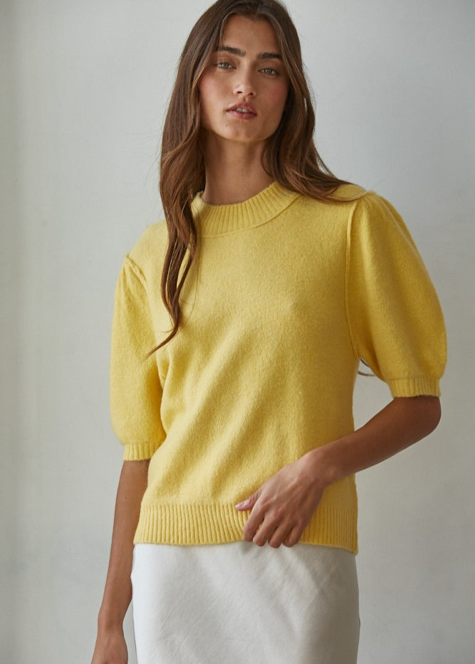 Model wearing the Soft Balloon Sleeve Short Sleeve Sweater in yellow, front portrait view