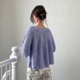 Back view of SoftSpun lavender textured knit sweater with airy lightweight design