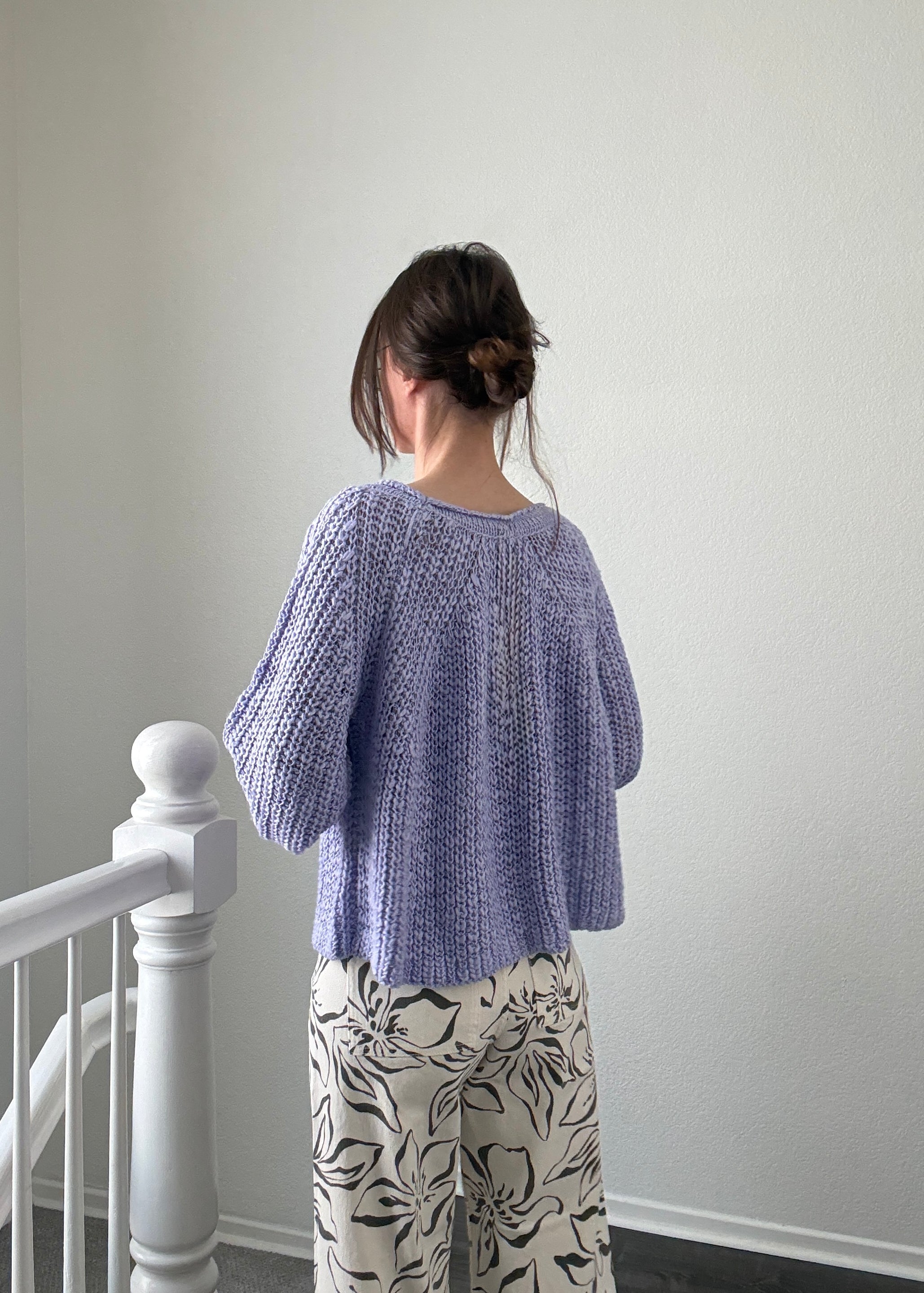 Back view of SoftSpun lavender textured knit sweater with airy lightweight design