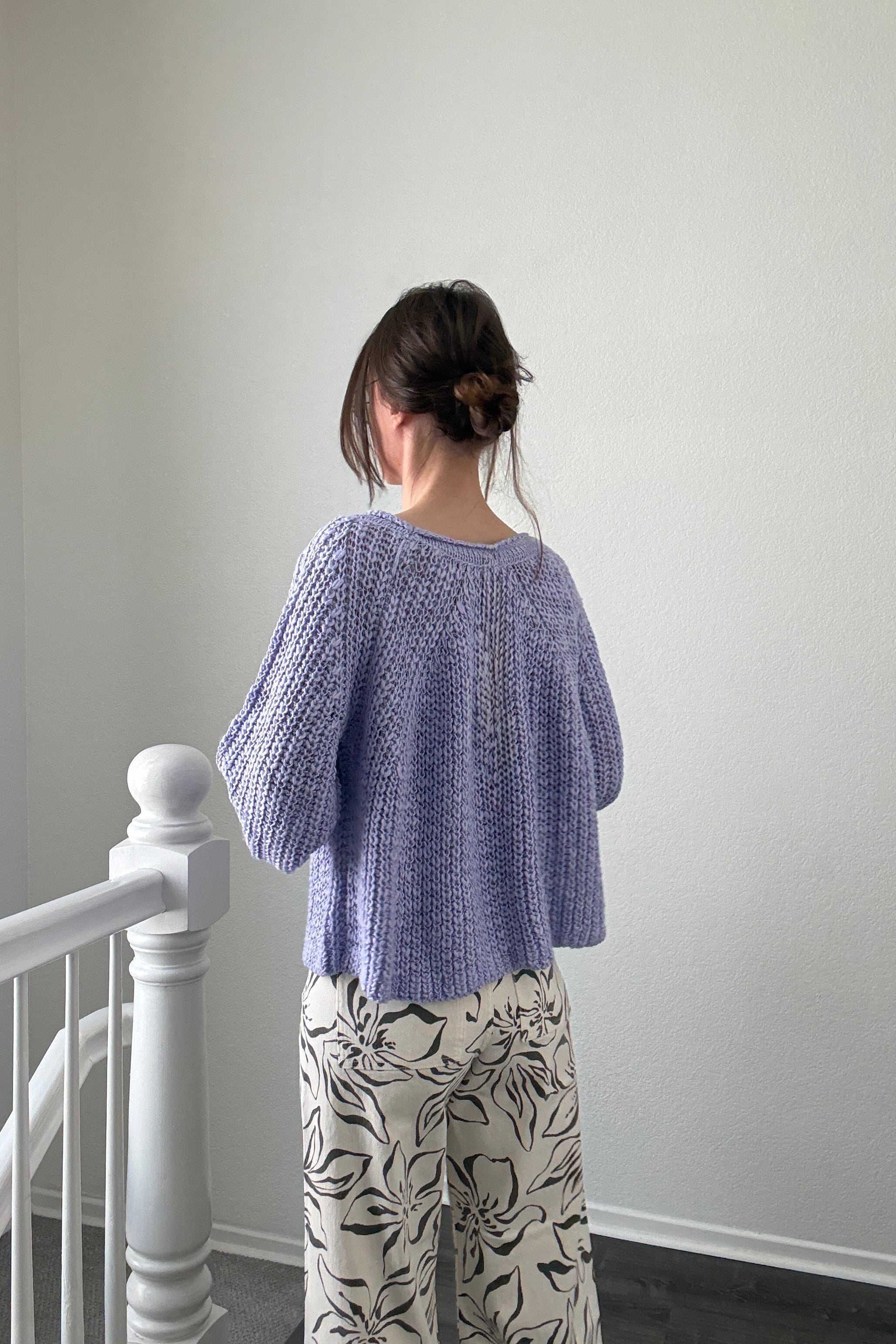 Back view of SoftSpun lavender textured knit sweater with airy lightweight design