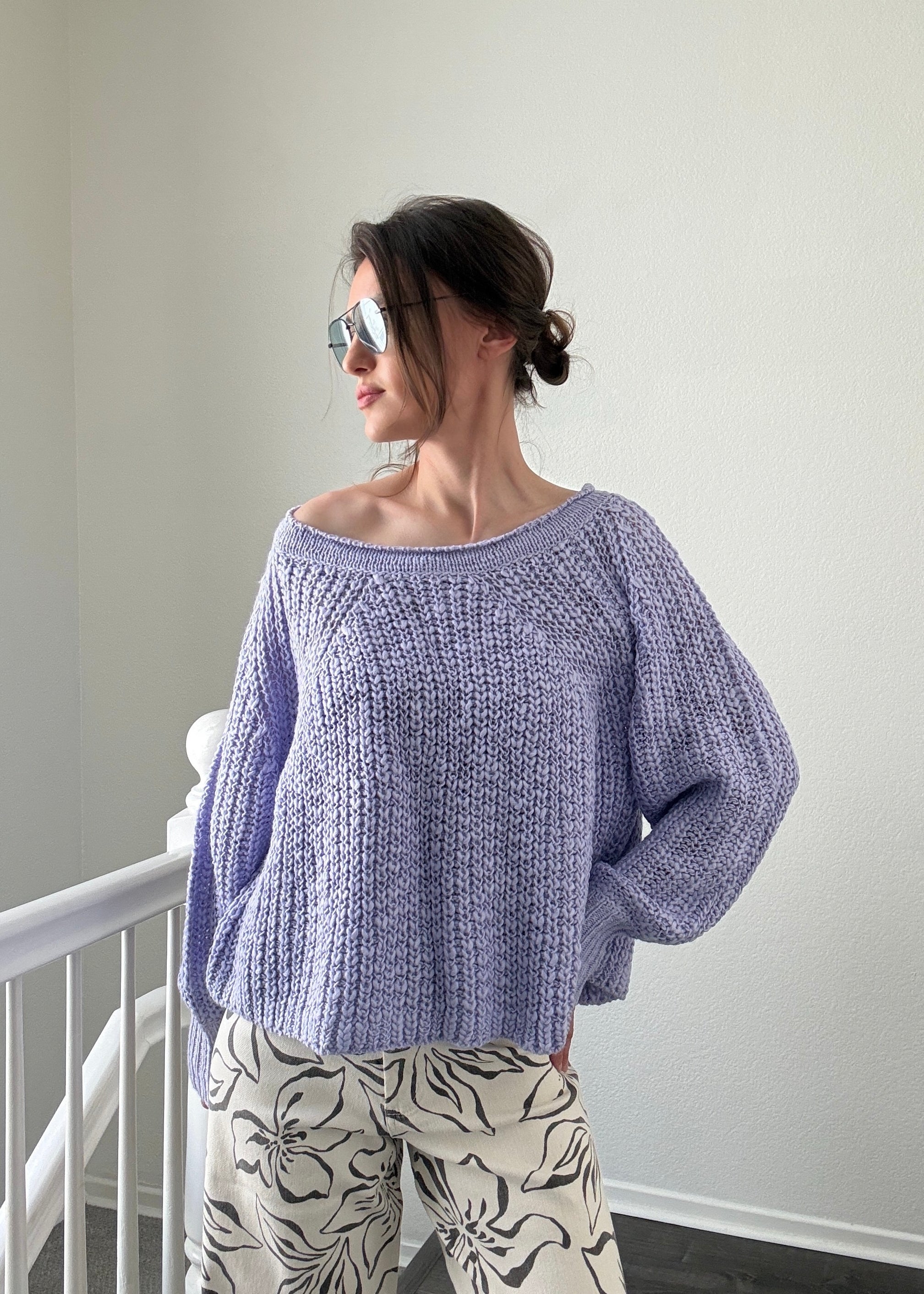 Woman wearing  SoftSpun textured boatneck sweater in lavender, front view with relaxed fit and airy knit