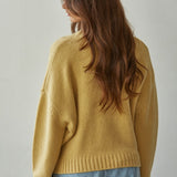 Back view of honey Sweater