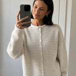 Things Between Piper Cardigan in Mini Striped Cream styled with blue jeans in mirror selfie
