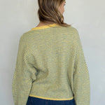 Things Between Piper Cardigan in Pin-Striped Butter, back studio view showing the relaxed fit and lightweight knit