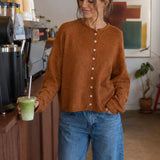 Things Between Piper Cardigan in Rust styled for a casual café outfit