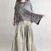 Trinity flowy oversized top in charcoal with relaxed fit and curved hem